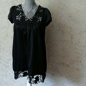 Black polyester and spandex top